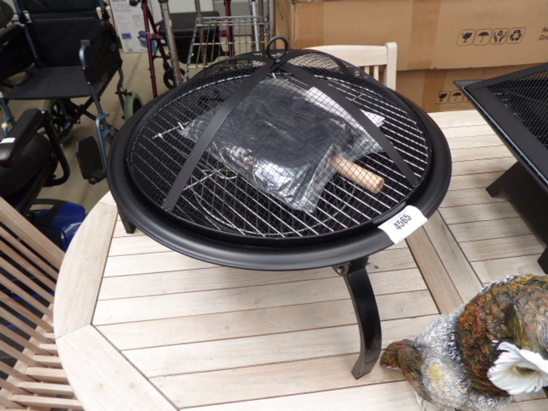 Small round fire pit with barbecue grill