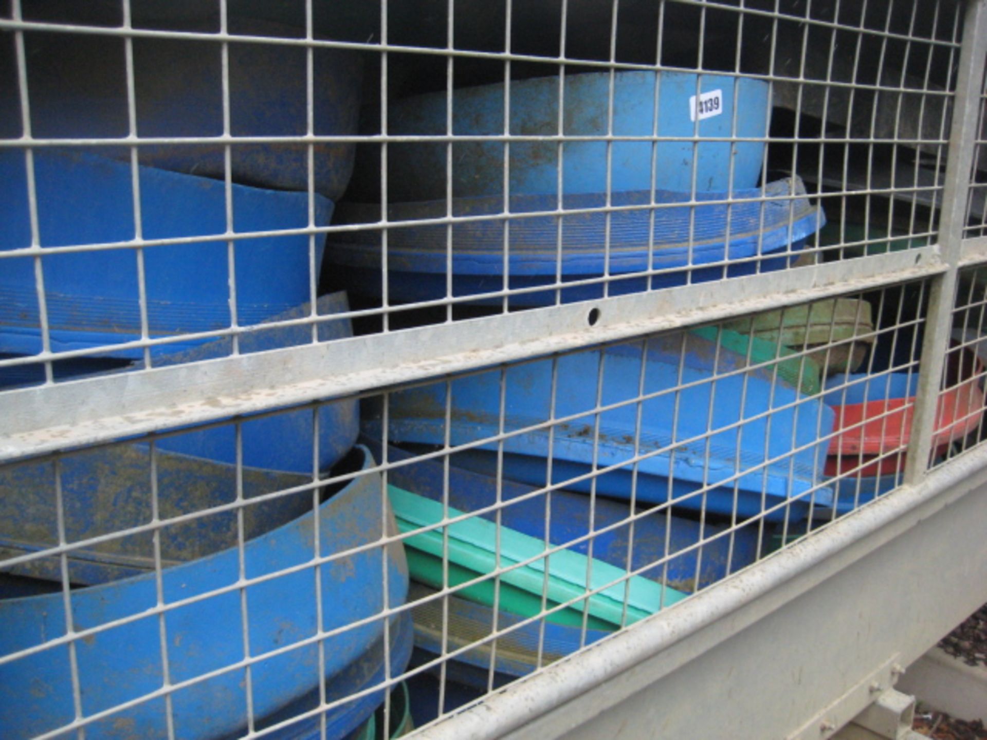 Large quantity of cut down barrel feeding troughs