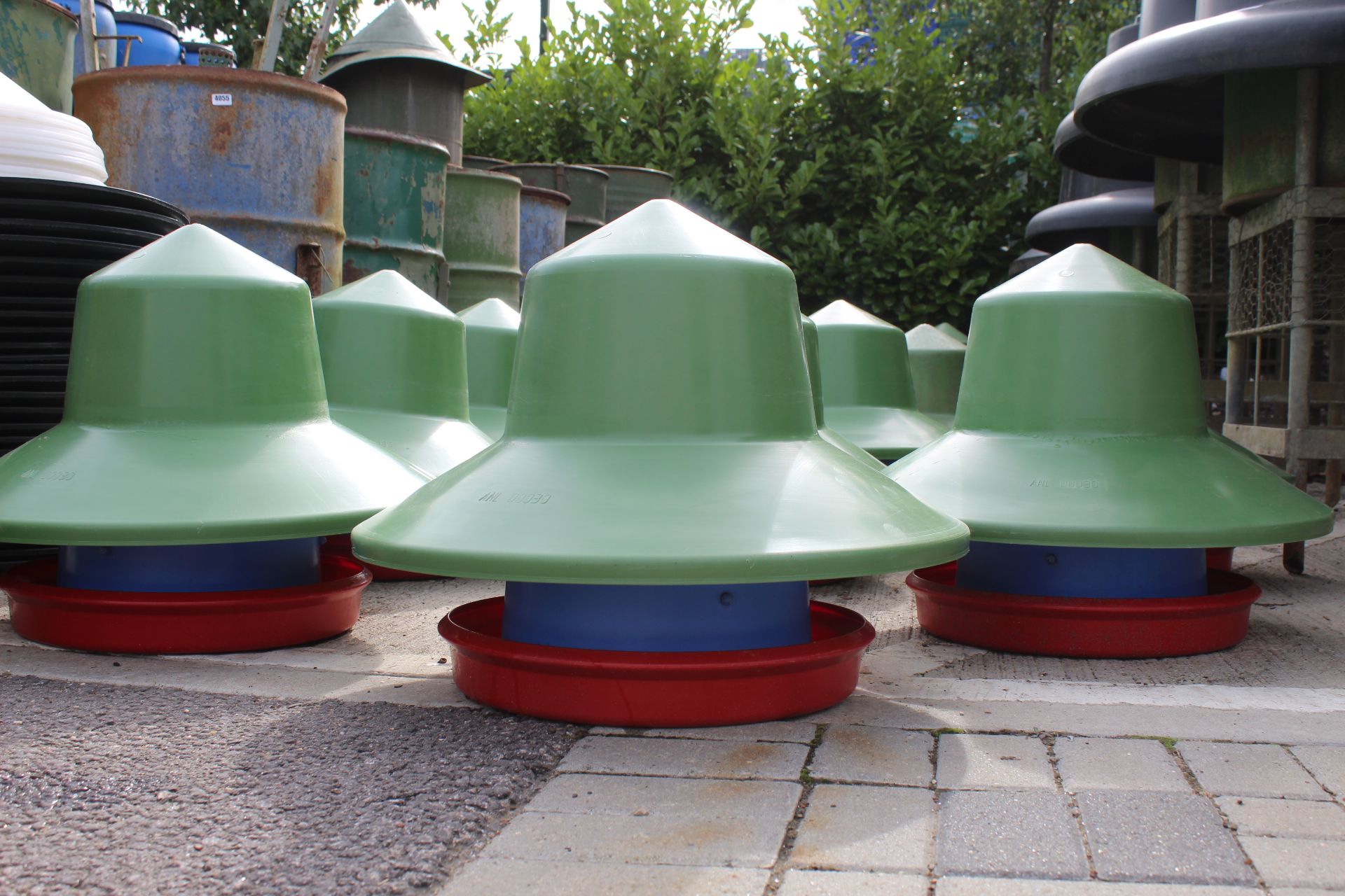 12 x Manola Feeder Outdoor feeders with green top hat covers by Quill Productions