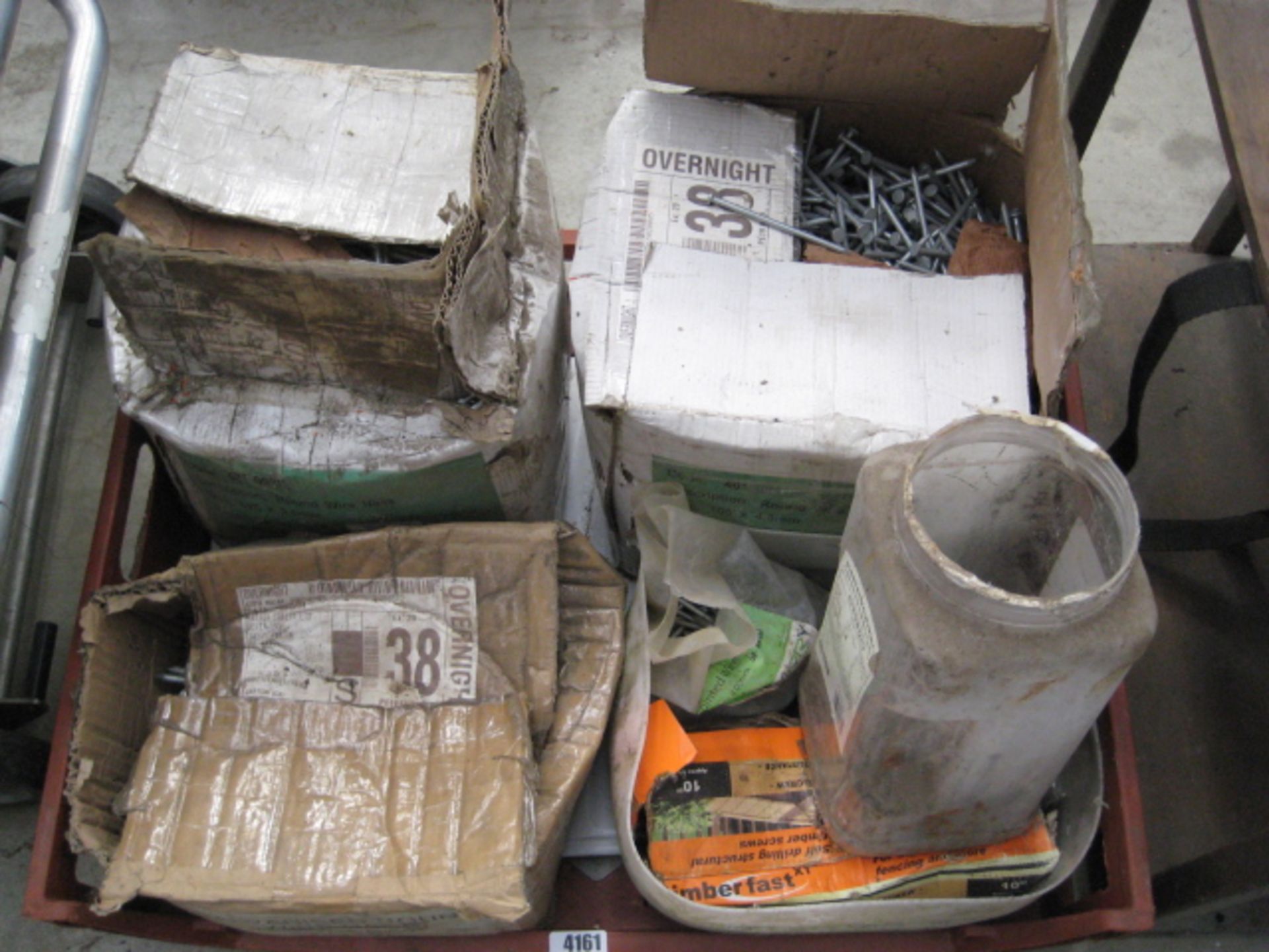 Crate of various large size galvanized nails