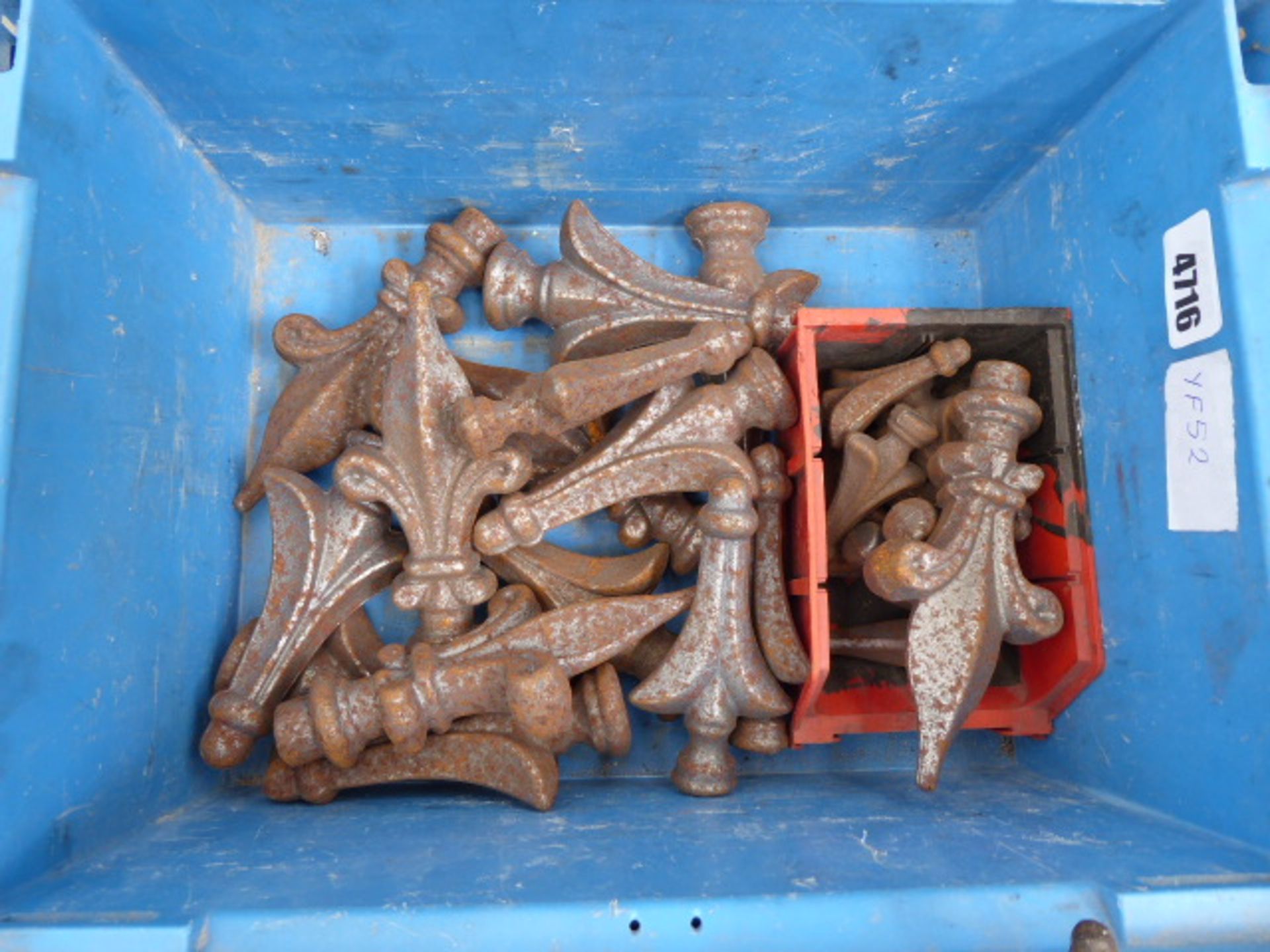 Box of metal fence finials