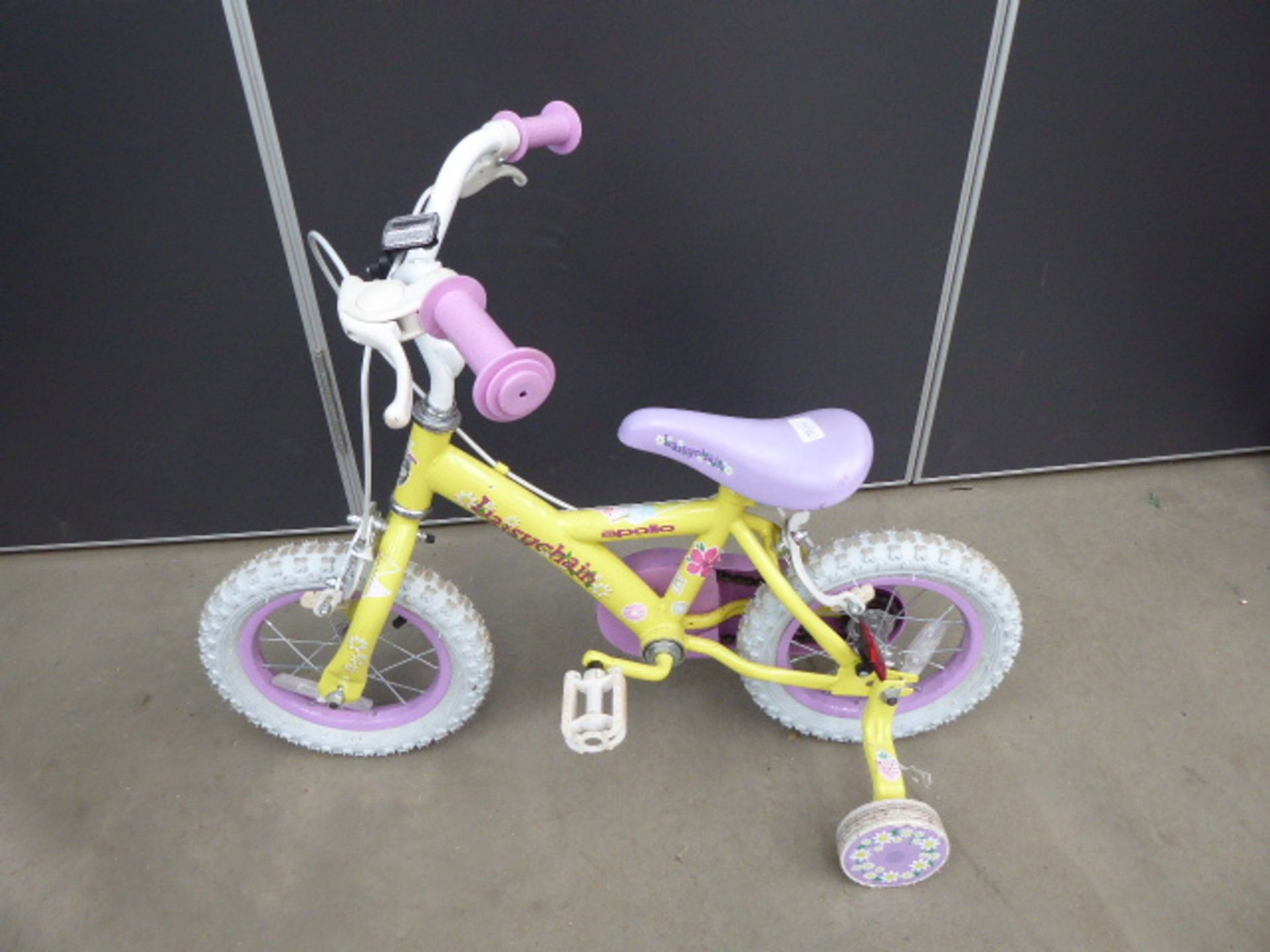 2 Yellow and purple girls bikes