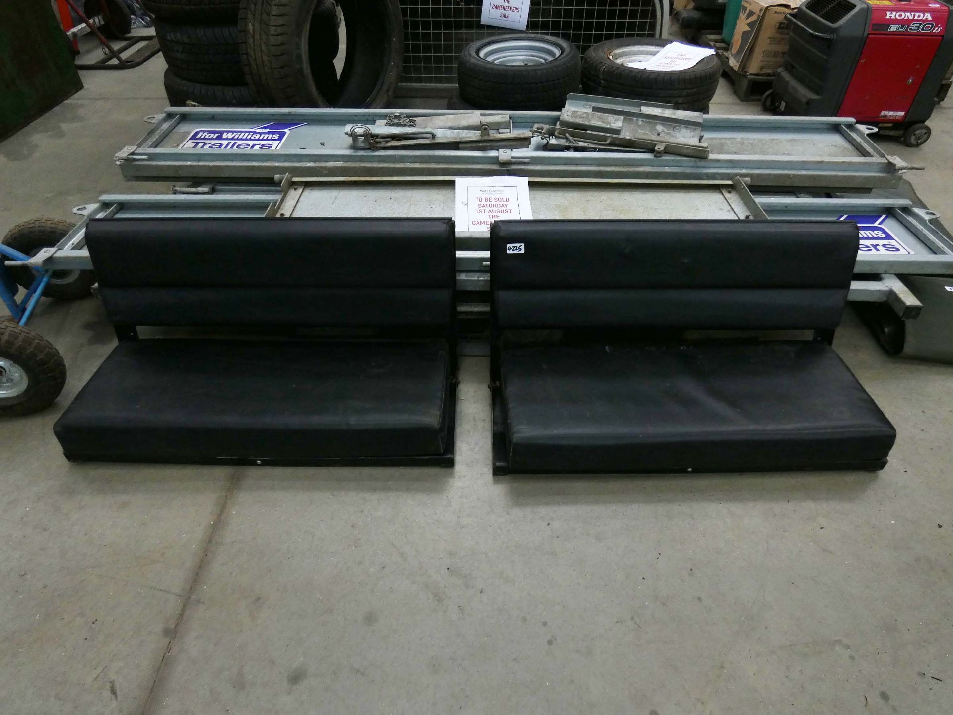 Two Landrover rear folding bench seats