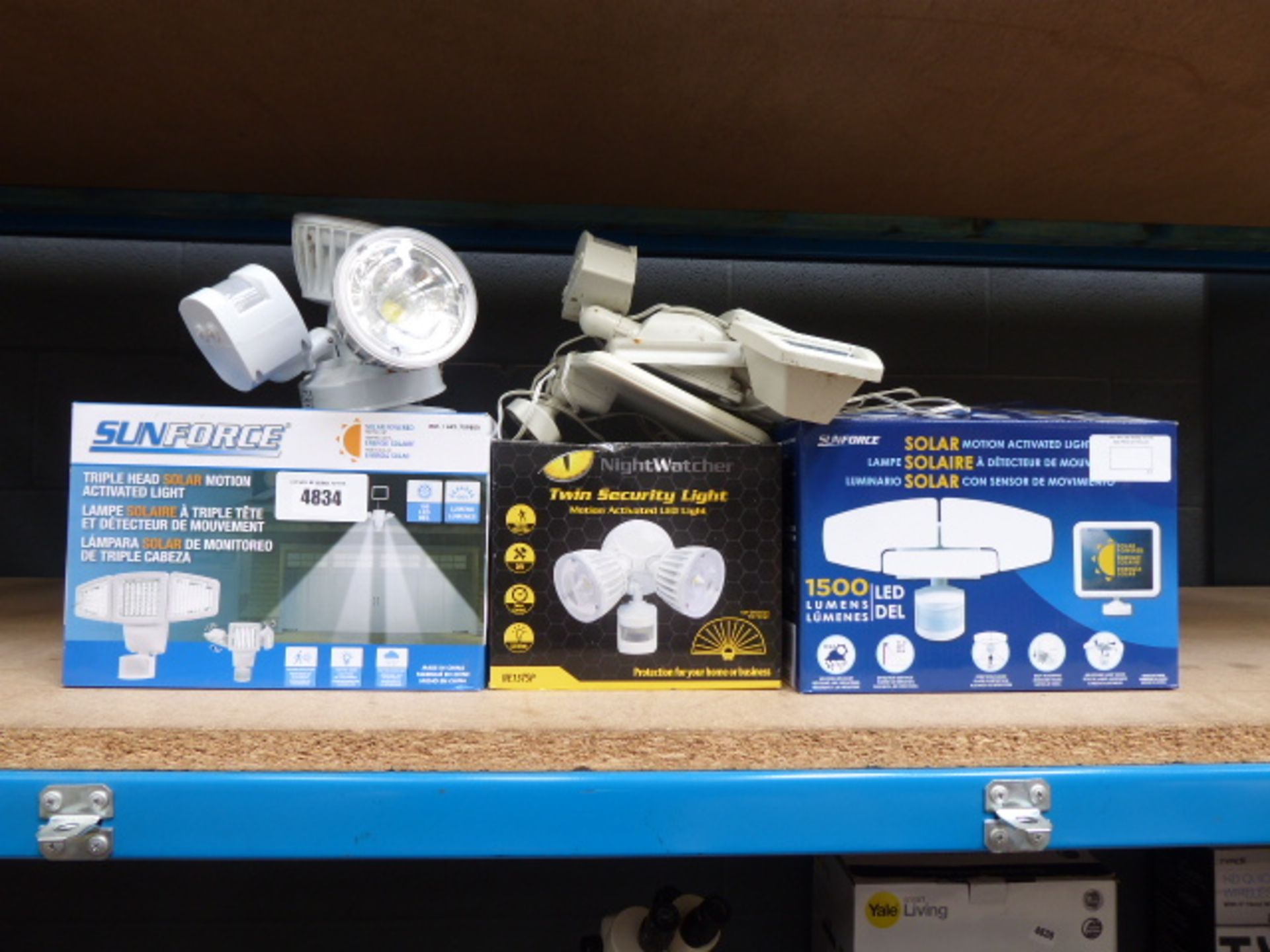3 Boxed and 2 unboxed solar motion lights