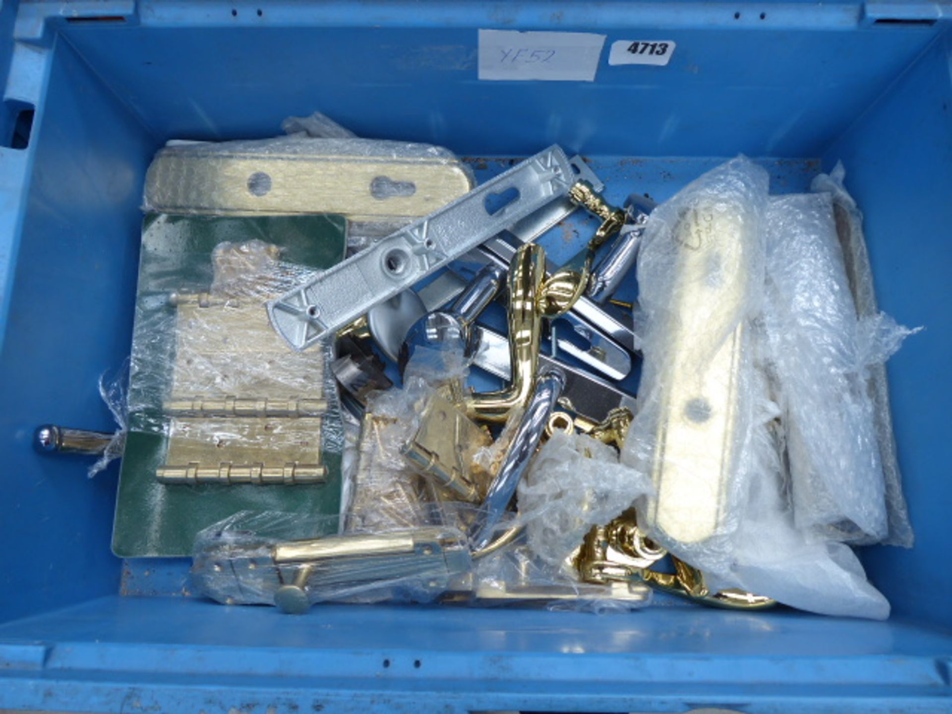 Box of brass and silver door handles and door furniture