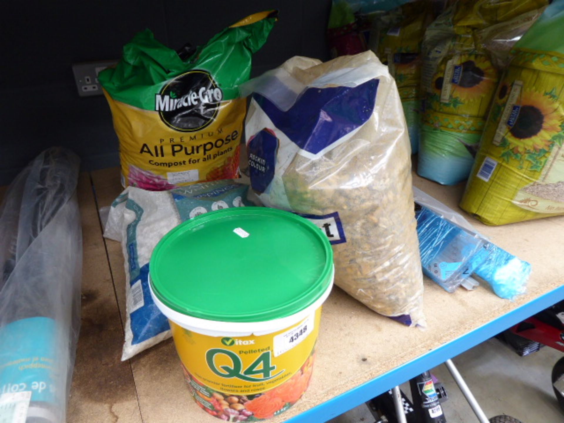 Pot of fertiliser pallets, 2 pots of stone, multi purpose compost and a greenhouse vent