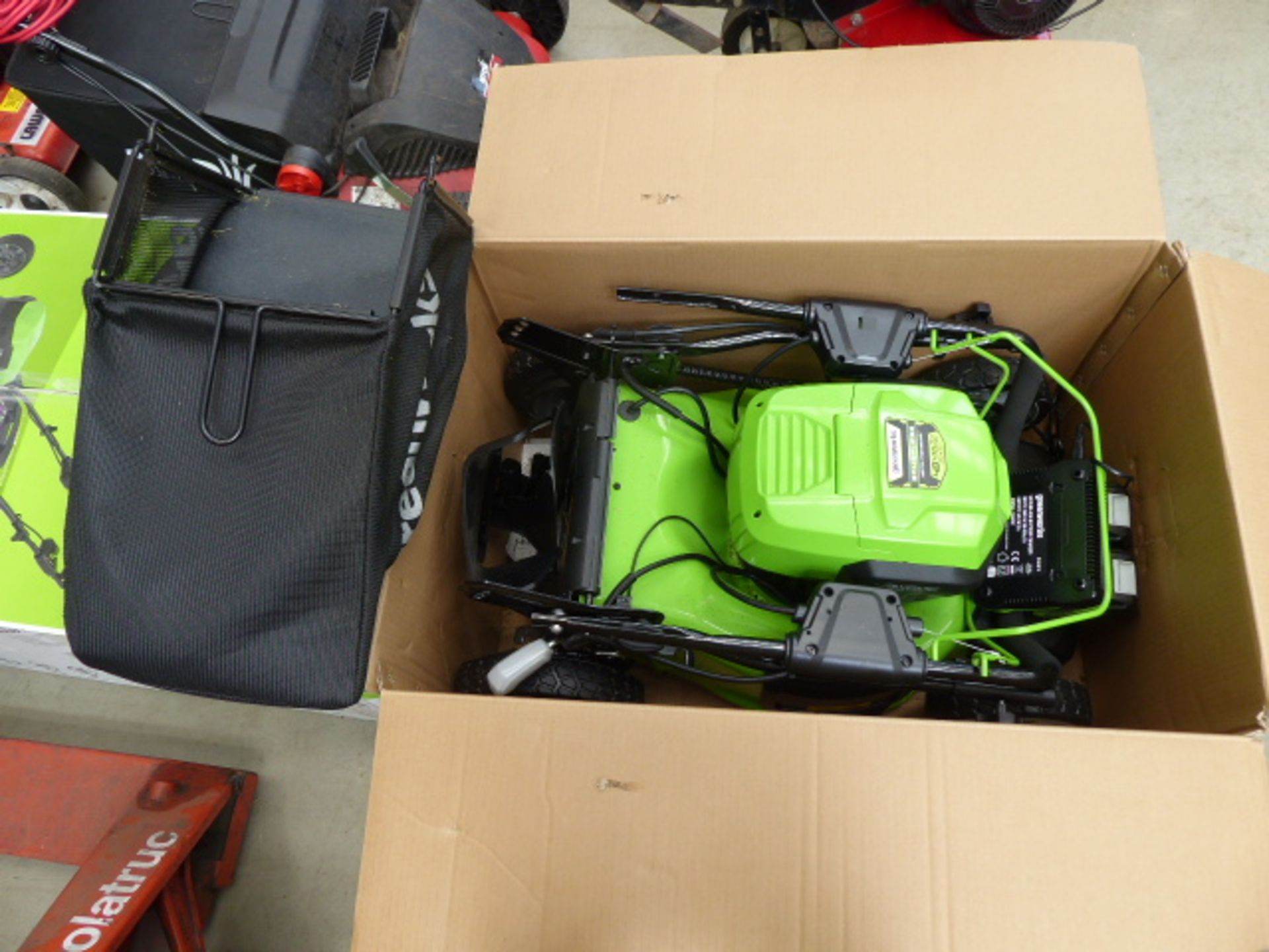 Greenworks boxed battery powered mower with 2 batteries and charger