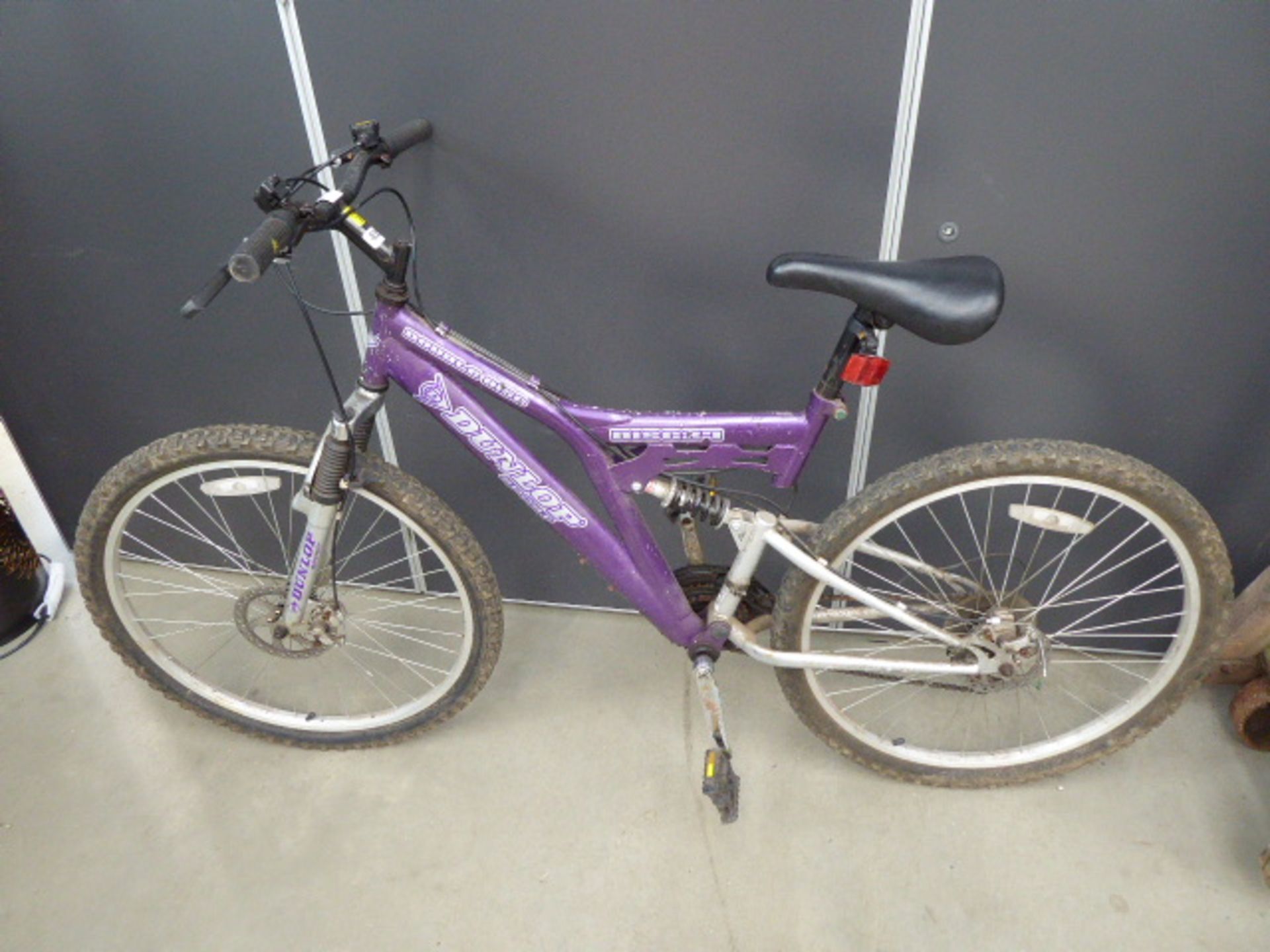 Purple Dunlop suspension mountain bike