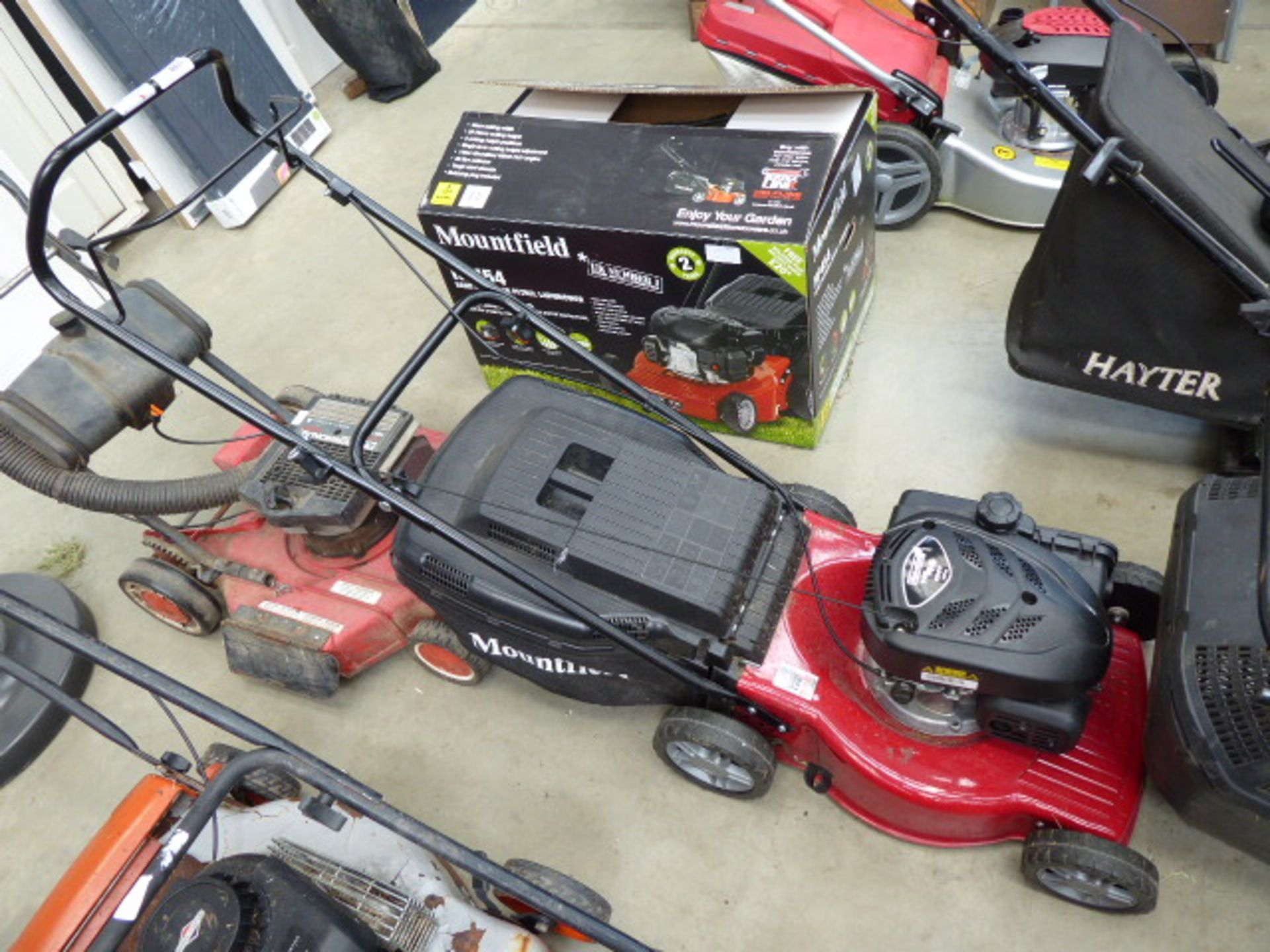 Mountfield red petrol powered rotary mower with grass box