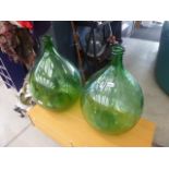 Pair of green glass carboys