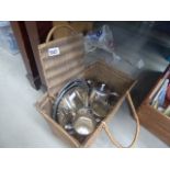 Wicker basket with silver plated trophies, a hotel plate teapot and trays
