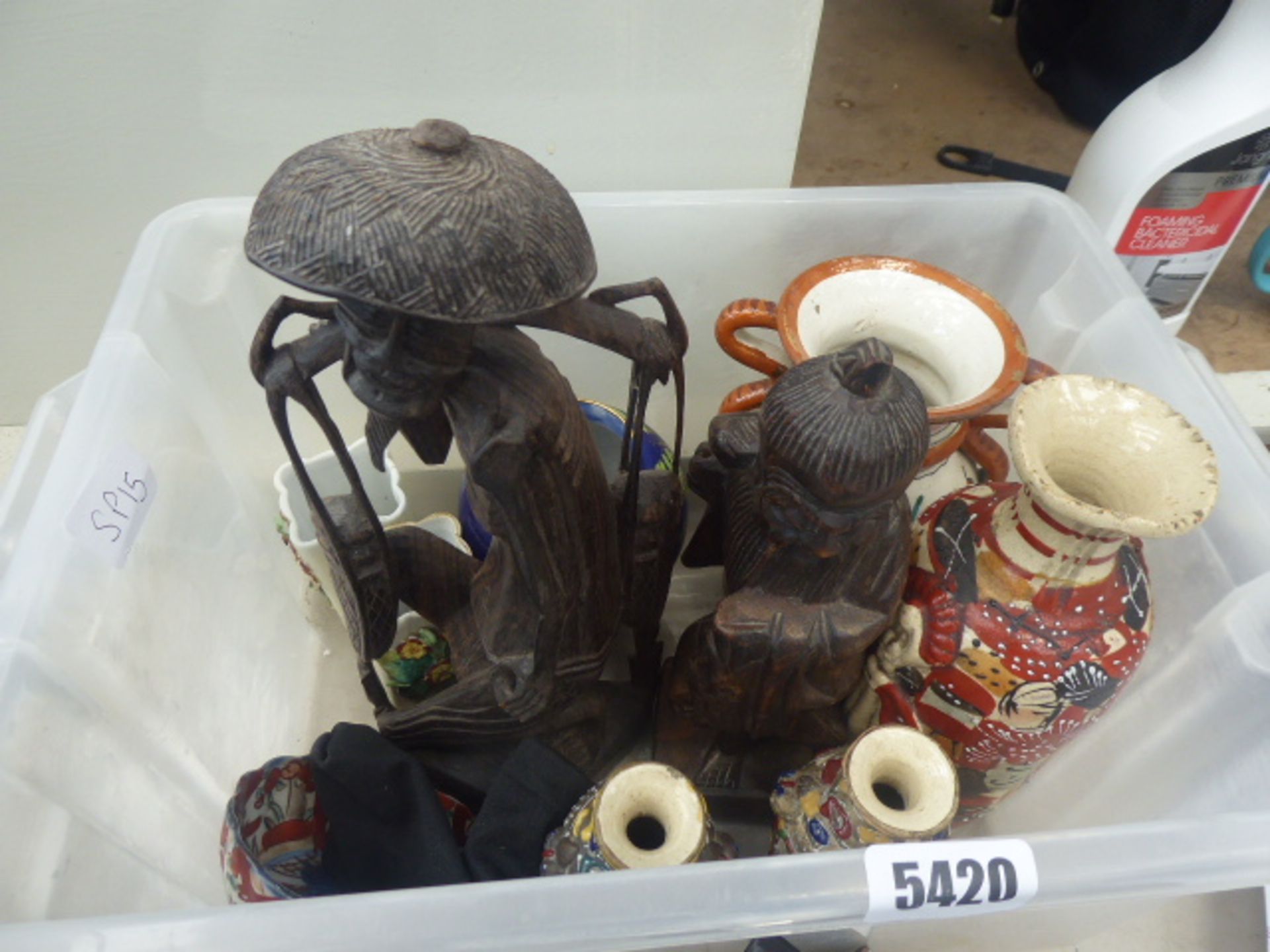 Box containing oriental figures and ceramics