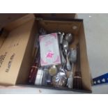 Box containing a quantity of loose cutlery