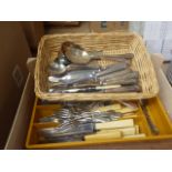 Box containing loose cutlery