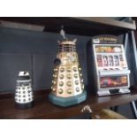 2 ornamental Daleks plus an ornamental fruit machine