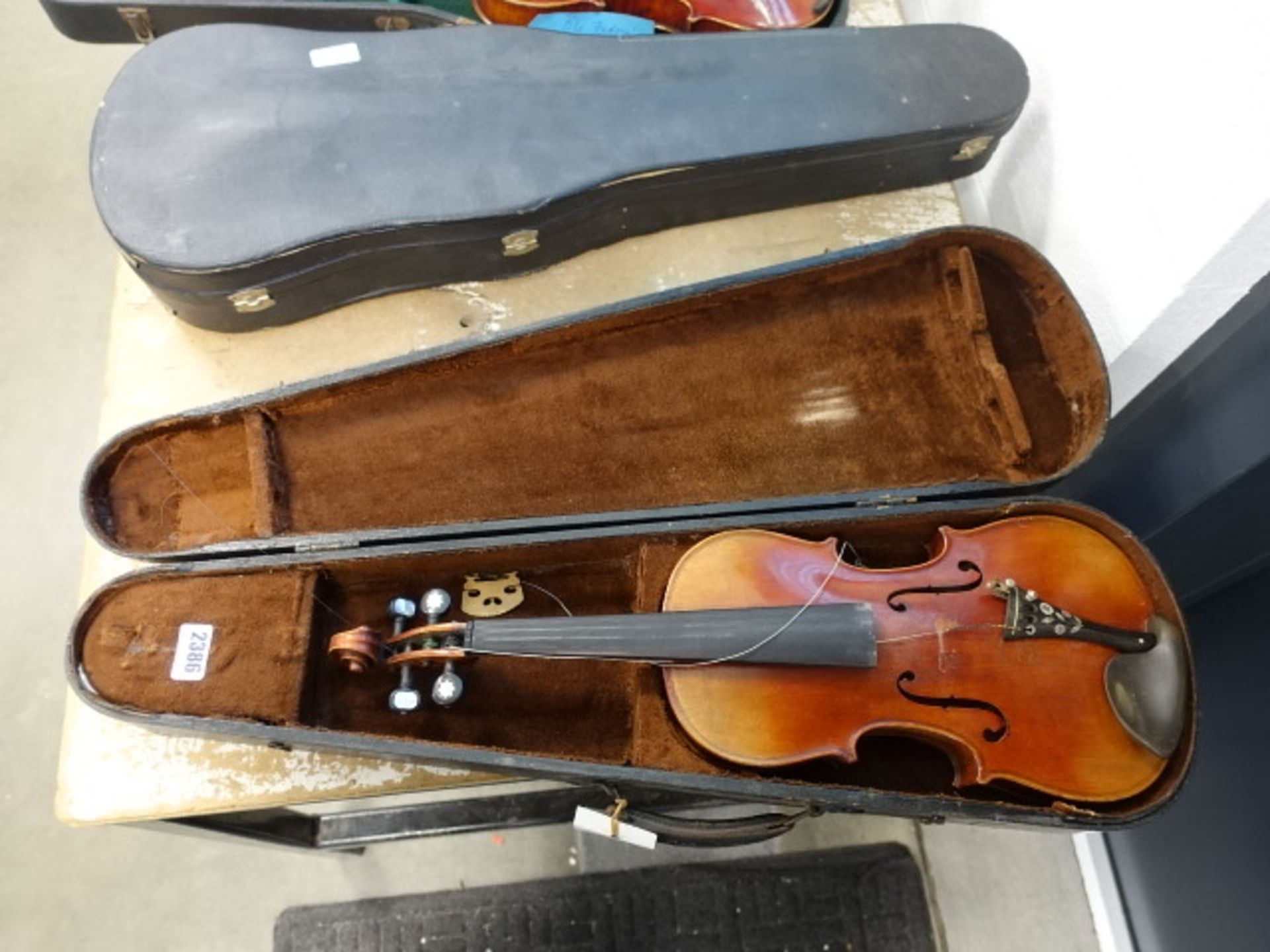 Violin in wooden case with insert decoration