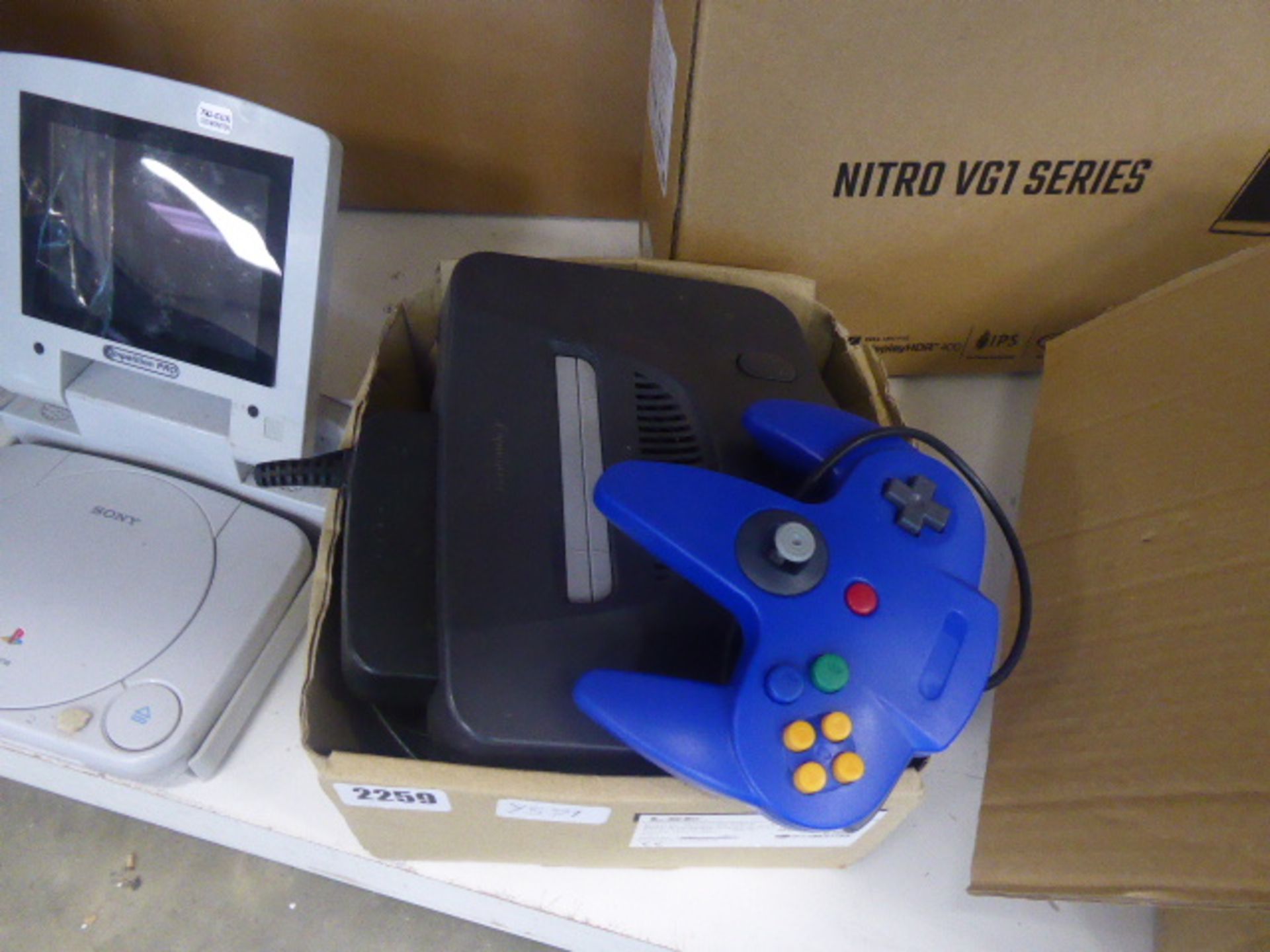 Nintendo N64 console with blue controller