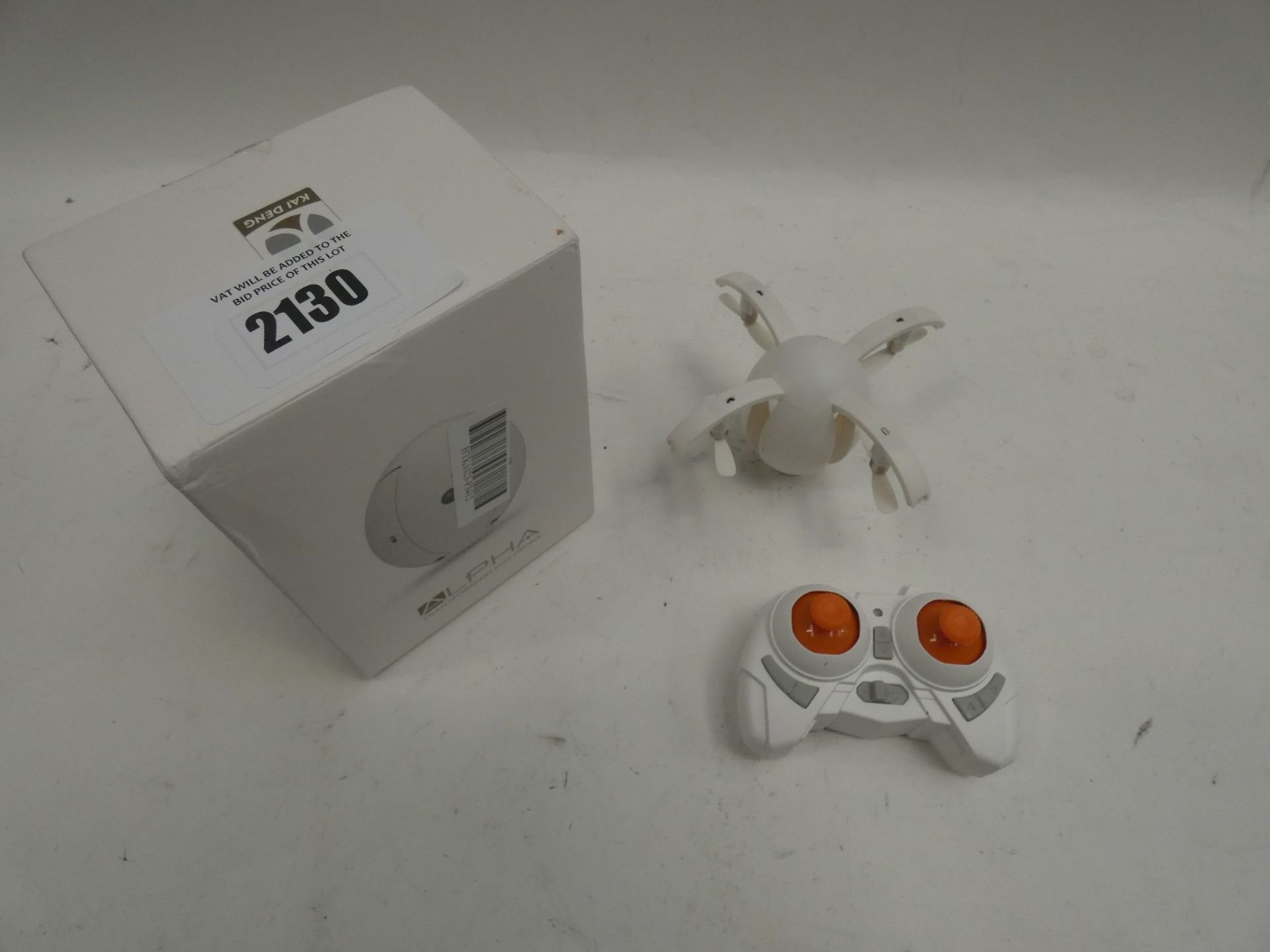 Alpha egg shaped drone with controller and box.