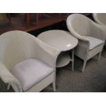 Pair of Lloyd Loom off white tub style dining chairs with matching circular coffee table