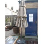 Wooden pole garden parasol in gold with stand