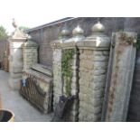 Fibreglass garden wall comprising 4 columns, 4 side sections, 2 metal railings and waterfall column