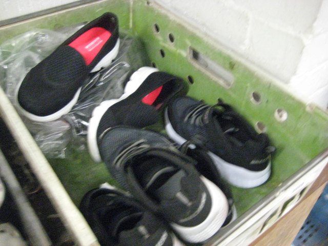 Crate of various Sketcher shoes