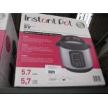 Instant pot Duo multi use pressure cooker in box