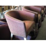 Pair of maroon and gilt fleck upholstered tub style restaurant seats by Morgan on tapered off