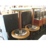 4 wooden circular bar tables on stainless single pedestal bases with glass surfaces