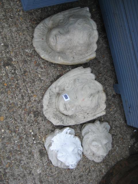 Pair of concrete wall planters in the form of girls with pair of lion concrete ornaments