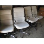 Set of 4 cream leather upholstered chrome frame swivel armchairs