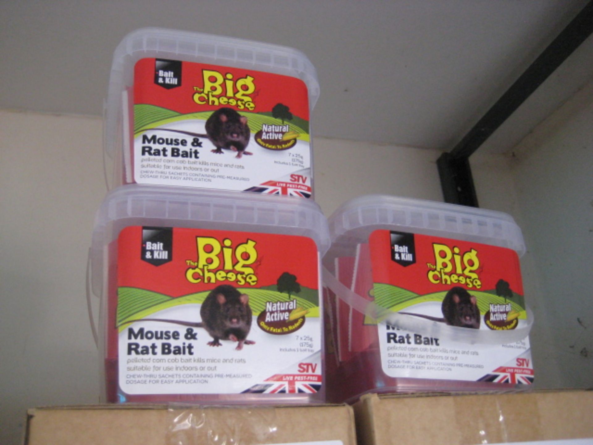 5 boxes containing Big Cheese mouse and rat bait