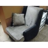 Black and white patterned deep arm chair