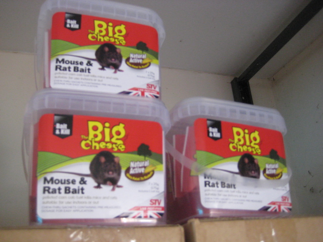 5 boxes containing Big Cheese mouse and rat bait