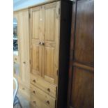 Pine small double door wardrobe with 3 drawers under