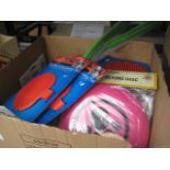 Box of various doggy balls, ball launchers, frisbies, grooming pads, etc.