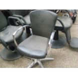 Chrome and black upholstered adjustable chair