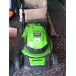 Greenworks brushless battery operated lawn mower with 2 batteries and battery charger unit