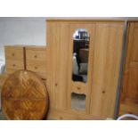 Limed oak bedroom suite comprising double door wardrobe with drawers under, chest of 6 drawers and 2