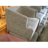 Pair of charcoal upholstered tub style restaurant seats