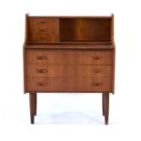 A 1970's Danish teak bureau, the gallery over a sloping front with three drawers, on tapering legs,