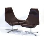 A pair of Matteo Grassi '2Leather Range' highback swivel chairs upholstered in brown leather with