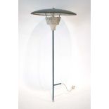 A 1950's outdoor lamp, the turquoise enamelled shade on a matching shaft,