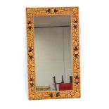 A 1970's Swedish mirror, the pine and cut pine frame of rectangular form,