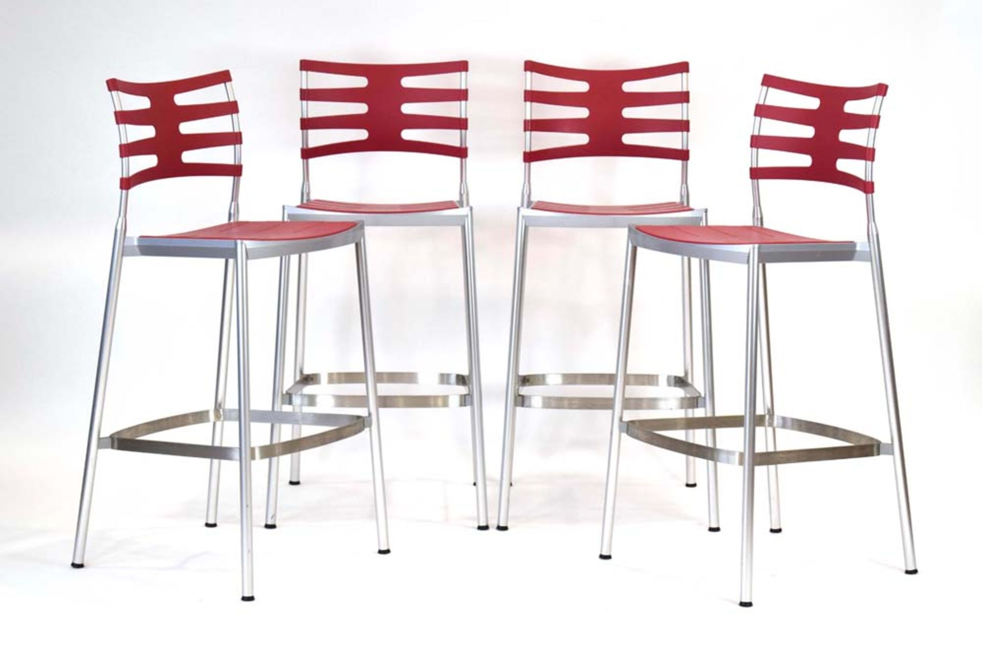 Kasper Salto for Fritz Hansen, a set of four 'Ice Bar Stools' with red seats and backs,