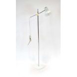 A 1970's white enamelled standard lamp with a stainless steel shaft CONDITION REPORT: