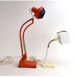 A Swedish orange adjustable desk lamp by Ledu,