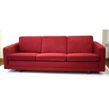 A 1960's Danish three-seater deep red fully upholstered sofa designed by Borge Mogensen *Sold