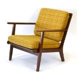 A 1960's Danish beech armchair with loose upholstery *Sold Subject to our Soft Furnishings
