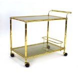 A 1970's brass and faux bamboo tea trolley CONDITION REPORT: Structurally sound.